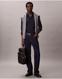 Calvin Klein - Emblem AOP Emboss Round Backpack