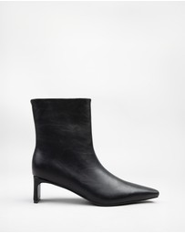 RAID - Penelope flat heeled ankle boots in black