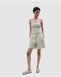 UNISON - Leather Look Shirred Top