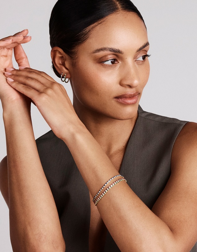 Michael Hill - 0.22 Carat TW Diamond and Created Sapphire Huggie Hoop Earrings in 10kt Yellow Gold