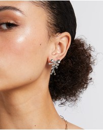 Karen Walker - Girl With The Bow Earrings