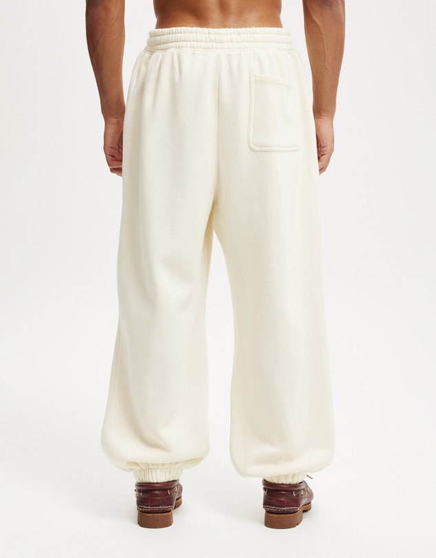 Cotton On - Super Baggy Cuffed Graphic Track Pant