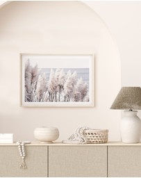 Olive et Oriel - Pampas By The Sea Art Print