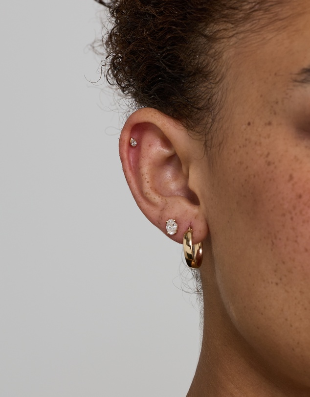 Michael Hill - Pear Cut Helix Single Stud Earring with 0.05 Carat TW of Diamonds in 10kt Gold