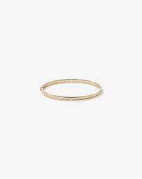 Michael Hill - Diamond Accent Oval Bangle in 10kt Yellow Gold