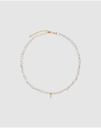 Karen Walker - Mini Girl with Pearls Necklace