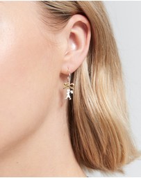 Karen Walker - Mini Girl with a Bow Hoops