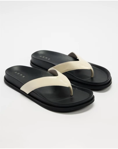AERE - Leather Footbed Thongs - Women's
