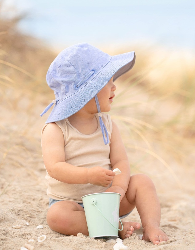 Toshi - Sunhat Xavier