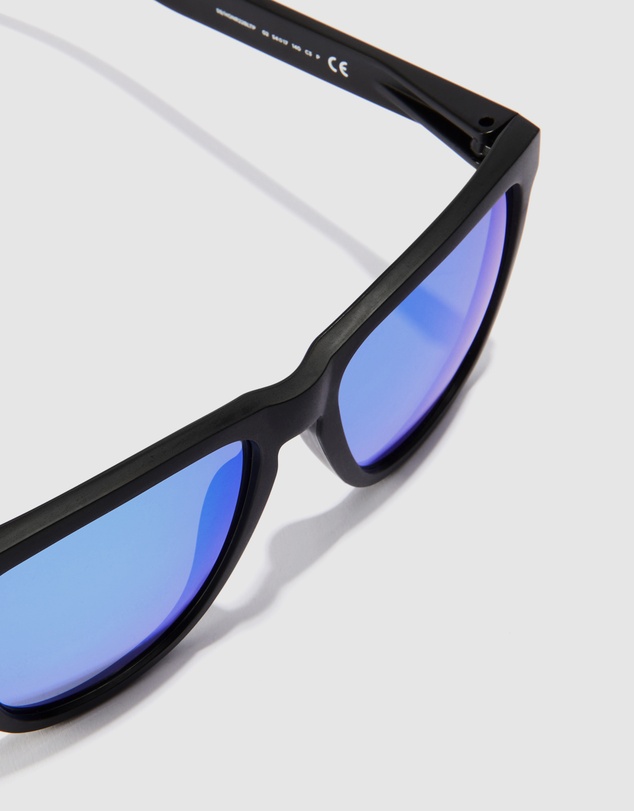 Hawkers Co - HAWKERS - Polarized Black Clear Blue ONE RAW Sunglasses for Men and Women UV400
