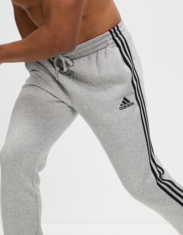 adidas Performance - Essentials Fleece Tapered Cuff 3-Stripes Pants