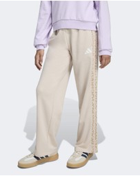 adidas Sportswear - SEASONALS ANIMAL PANTS Kids