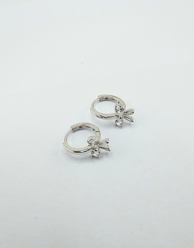 Izoa - Silver Bow Huggie Earrings