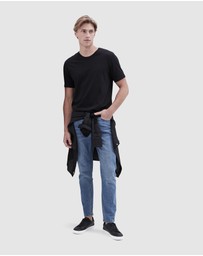 UNISON - Slim Tapered Jean