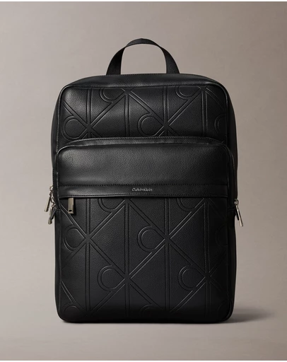 Calvin Klein - Emblem AOP Emboss Round Backpack