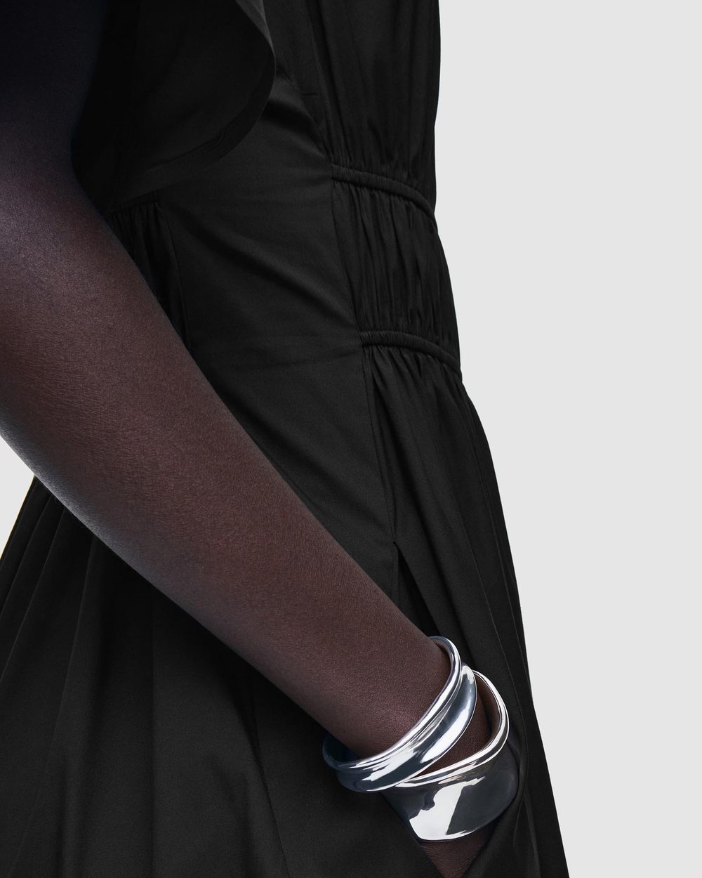 cos gathered open back midi dress COS: BIAS CUT LINEN BLEND MIDI DRESS Considered yet impactful silhouettes  lead the COS dress collection. Crafted from a lightweight blend of lyocell  and linen, this refined midi is cut on the