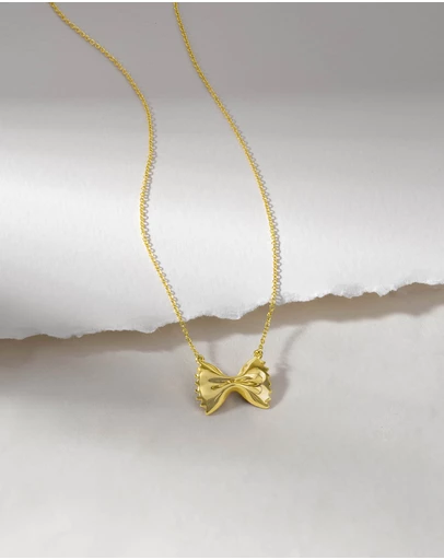 Wanderlust + Co - Bow Tie Pasta Gold Necklace