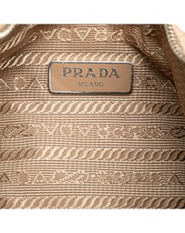 Pre-Loved by Azura Reborn - Pre-Loved prada Prada ReEdition 2005 Mini Bag Beige