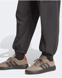 adidas Performance - AUDI REVOLUT F1 TEAM ELEVATED WOVEN PANT Mens