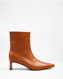 RAID - Penelope flat heeled ankle boots in tan