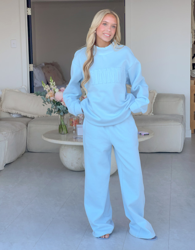 Beginning Boutique - Remy Blue Applique Mock Neck Sweater