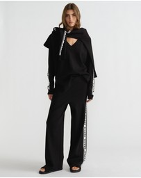 Decjuba - D-Luxe Logo Panel Knit Pants