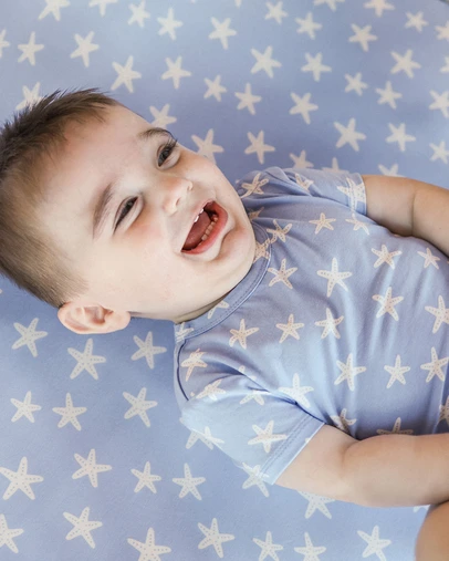 Kynd Baby - Fitted Cot Sheet in Star Fish Blue