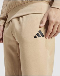 adidas Sportswear - Essentials Feelcozy Fleece Pants