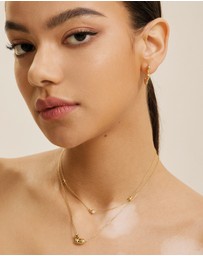 Ania Haie - Ania Haie Gold Twisted Wave Hoop Earrings