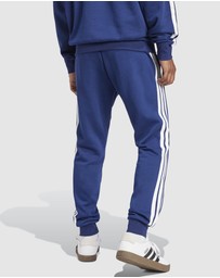 adidas Sportswear - Essentials Three Stripes Fleece Pants