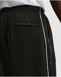 Nike - Sportswear Club Oversized Knit Track Pants