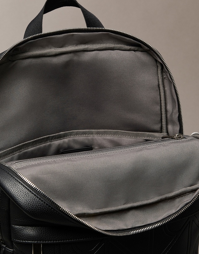 Calvin Klein - Emblem AOP Emboss Round Backpack