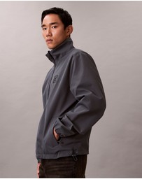 Calvin Klein Jeans - Allover Emblem Logo Reversible Jacket