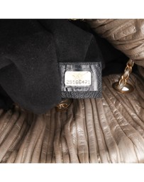 Pre-Loved by Azura Reborn - Pre-Loved chanel Pleated Leather Backpack Chain Detail
