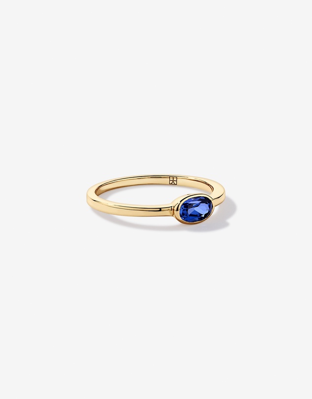 Michael Hill - Oval Blue Created Sapphire East-to-West Set Bezel Ring in 10kt Yellow Gold