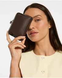 Status Anxiety - Volatile Purse