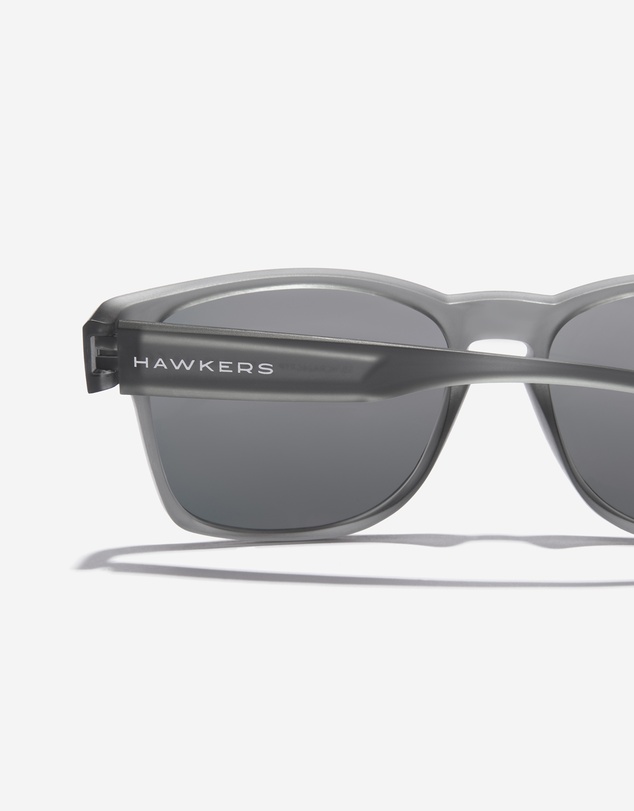 Hawkers Co - HAWKERS - Polarized Grey Ruby CORE RAW  Sunglasses for Men and Women UV400