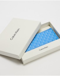 Calvin Klein - Emblem Allover Print Top Zip Cardcase