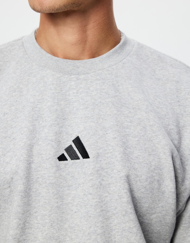 adidas Sportswear - Essentials Feelcozy Fleece Sweatshirt