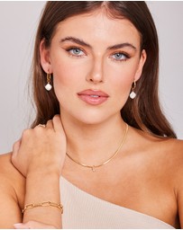 Zoe Olivia - Waterproof Freshwater Pearl Oval Huggie Hoops