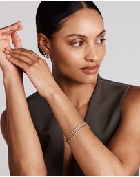 Michael Hill - 0.22 Carat TW Diamond and Created Emerald Huggie Hoop Earrings in 10kt Yellow Gold