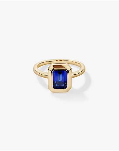 Michael Hill - Emerald Cut Created Sapphire Bezel Ring in 10kt Yellow Gold