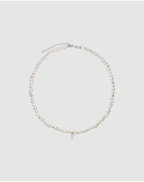 Karen Walker - Mini Girl with Pearls Necklace