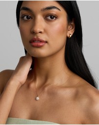 Michael Hill - 0.25 Carat TW Diamond Round Cluster Pendant with Halo in 10kt Yellow Gold