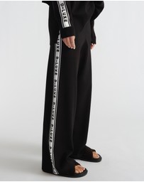 Decjuba - D-Luxe Logo Panel Knit Pants