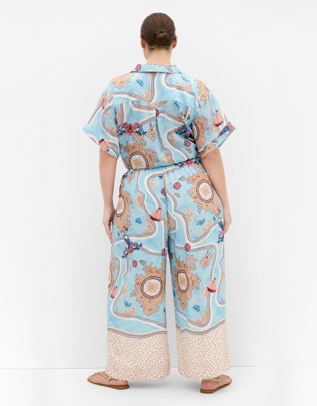 City Chic - Plus size Postcard Voyage Print Wide Leg Pant - sky blue