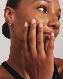 Michael Hill - Oval Cut Green Emerald Gemstone and 0.08 Carat TW Diamond Halo Ring in 10kt Yellow Gold