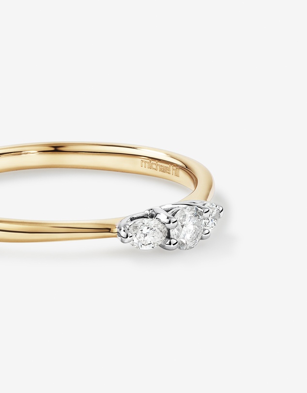 Michael Hill - 0.15 Carat TW Three Stone Round Brilliant and Oval Cut Diamond Promise Ring in 10kt Yellow and White Gold