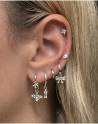 Izoa - Silver Bow Huggie Earrings