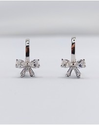 Izoa - Silver Bow Huggie Earrings